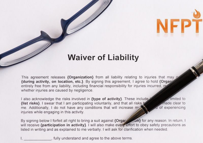 Liability Waiver Forms and Your Legal Position as a Personal Trainer 2 Waiver Of Liability On The White Paper With Pen